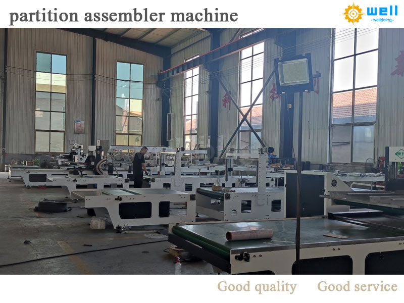 Automatic cardboard box partition assembly machine